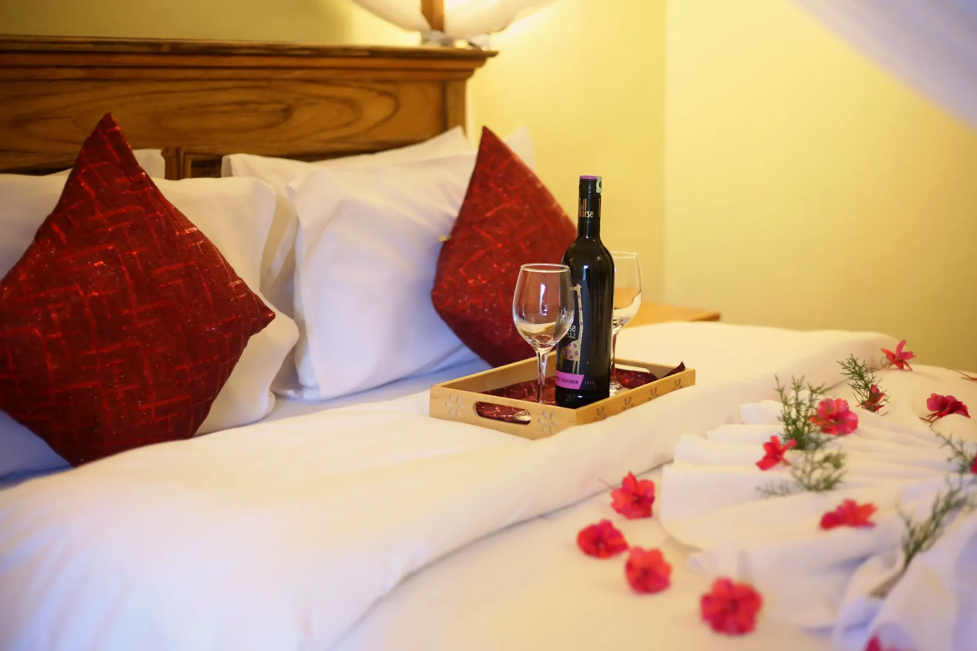 The view room at Mullers set with wine and petals on crisp white linen